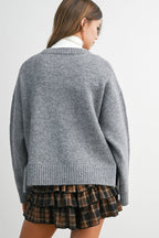 THE DARLING BOW SWEATER