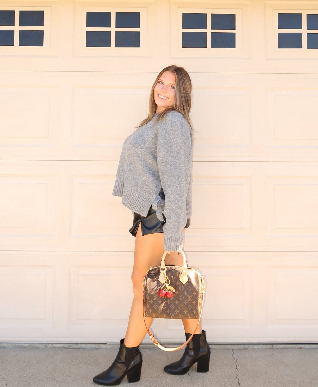 THE DARLING BOW SWEATER