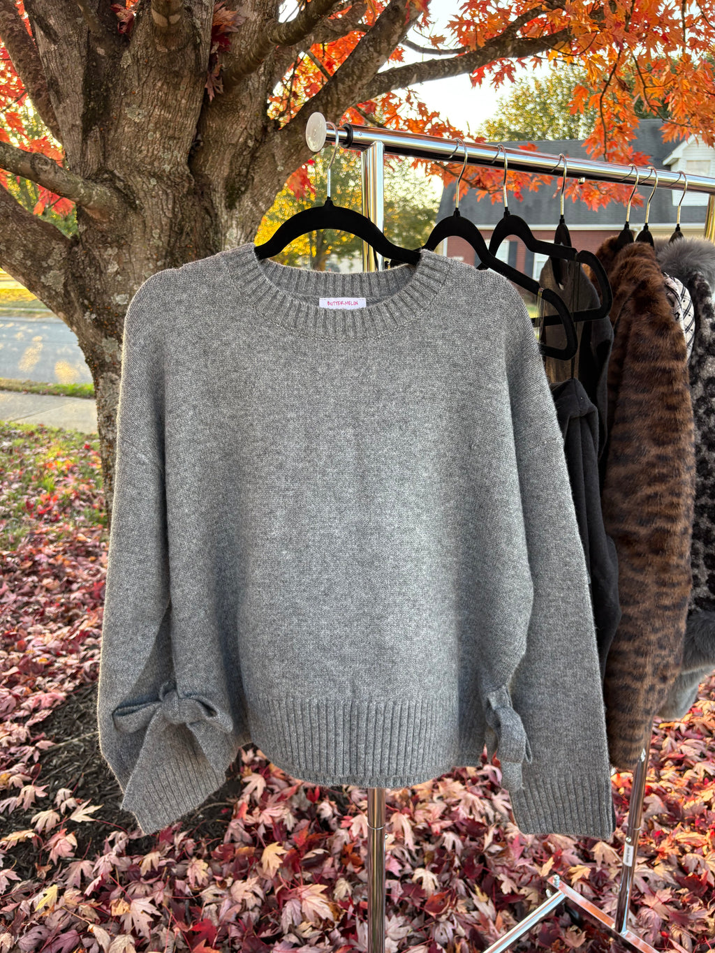 THE DARLING BOW SWEATER