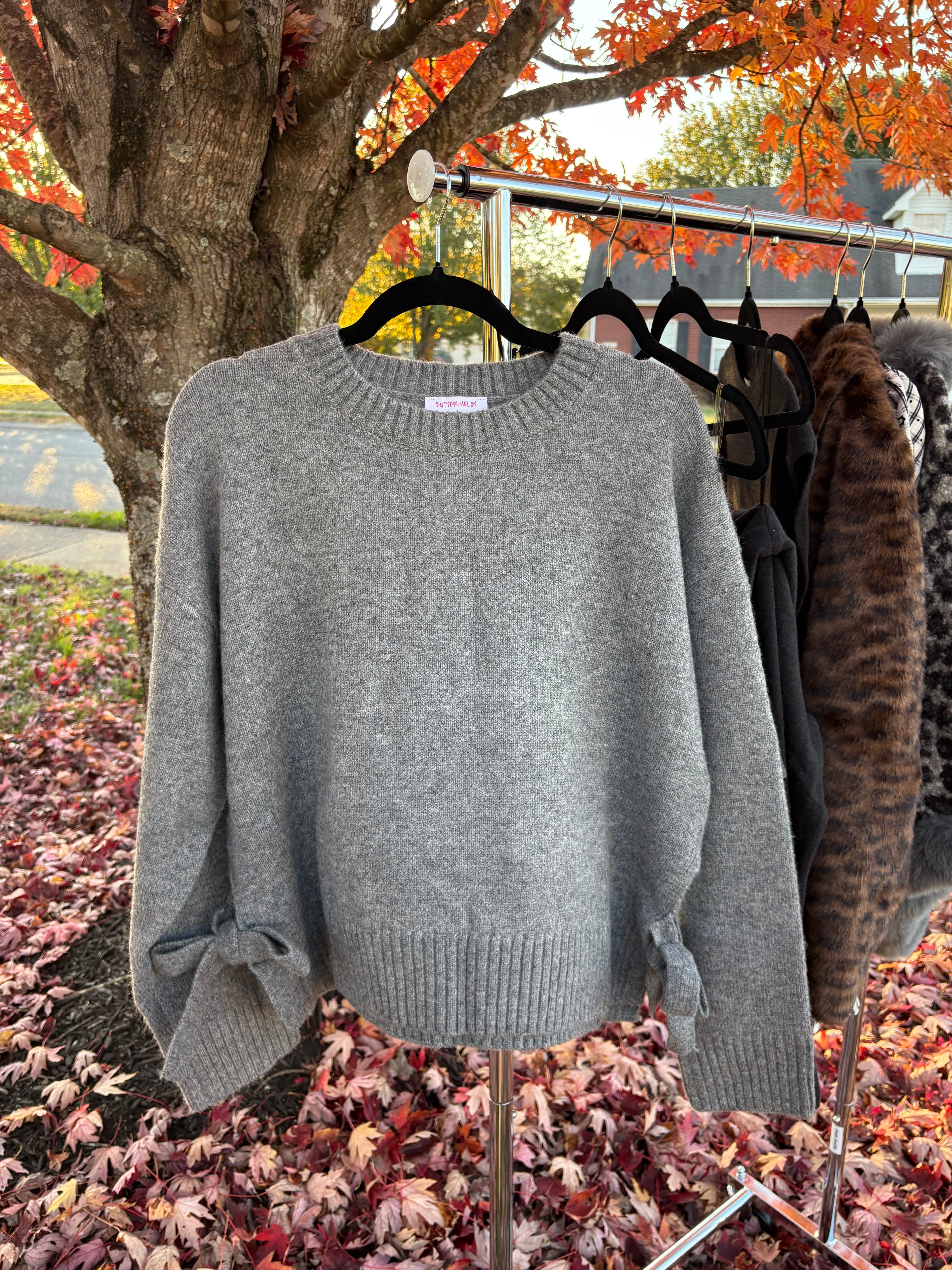 THE DARLING BOW SWEATER