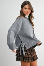 THE DARLING BOW SWEATER